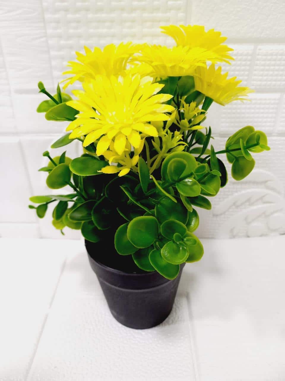 Macetita con flores artificiales