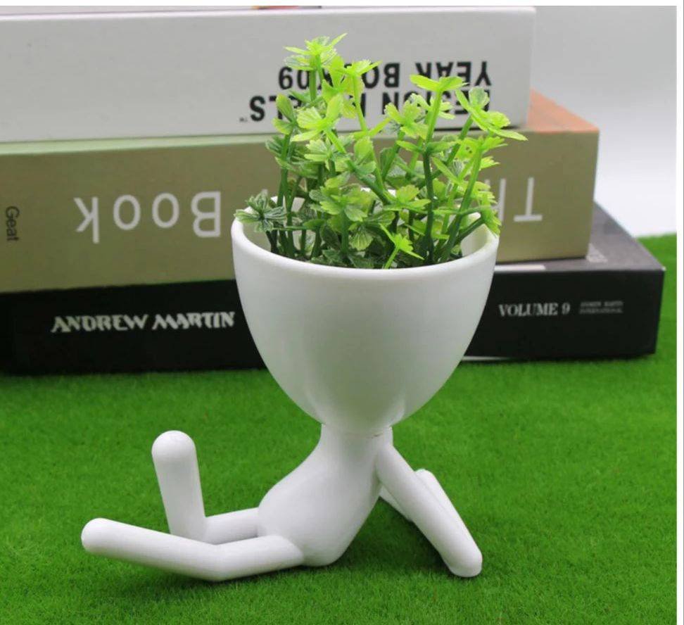 Maceteros Humanoides con planta artificial